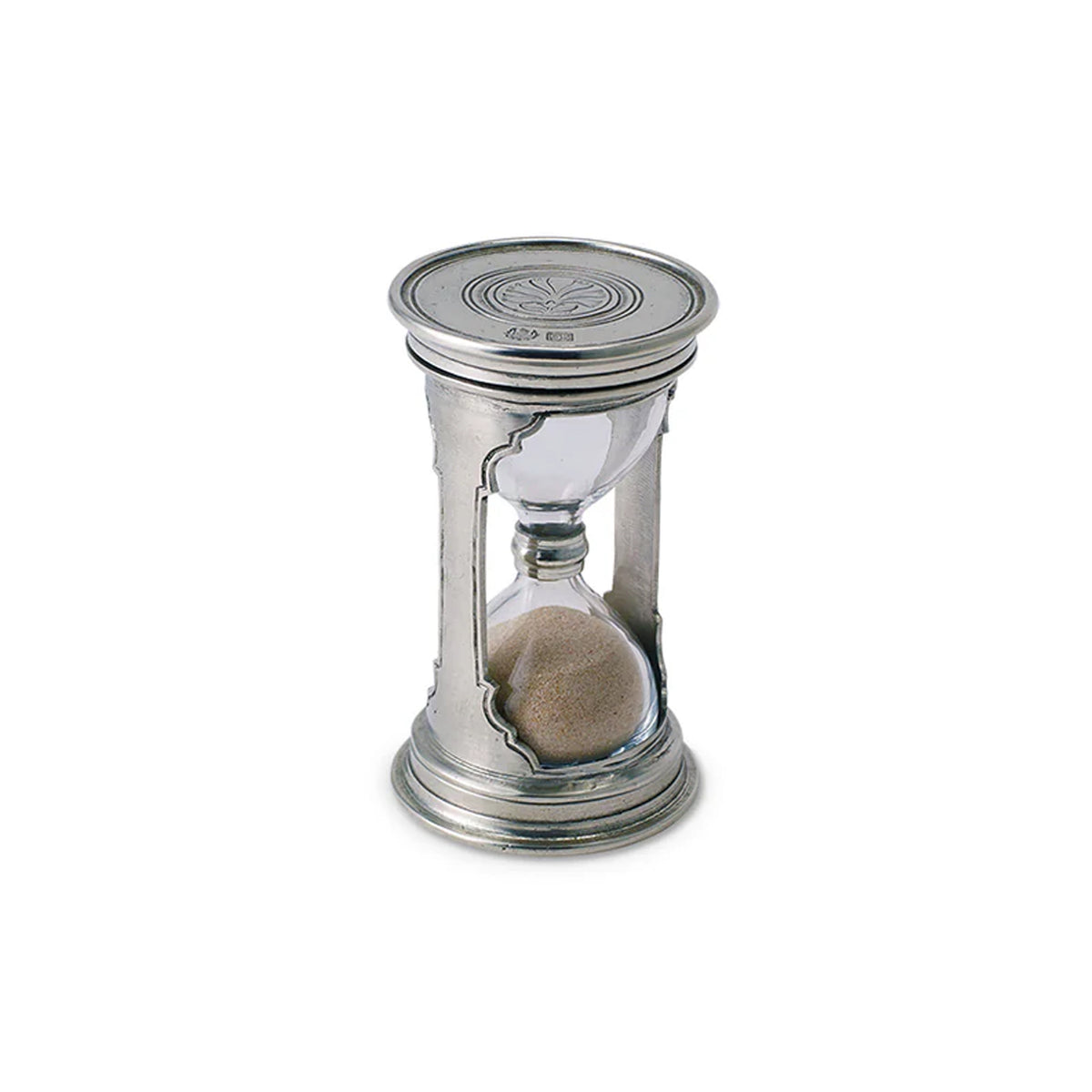 Front view of small round pewter hourglass showing clear glass bulbs, natural sand, and decorative engraved top on white background