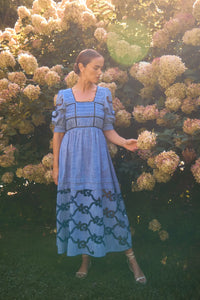 Embroidered Midi Dress with a square neckline, crochet lace tracing the bodice, skirt, and sleeves.