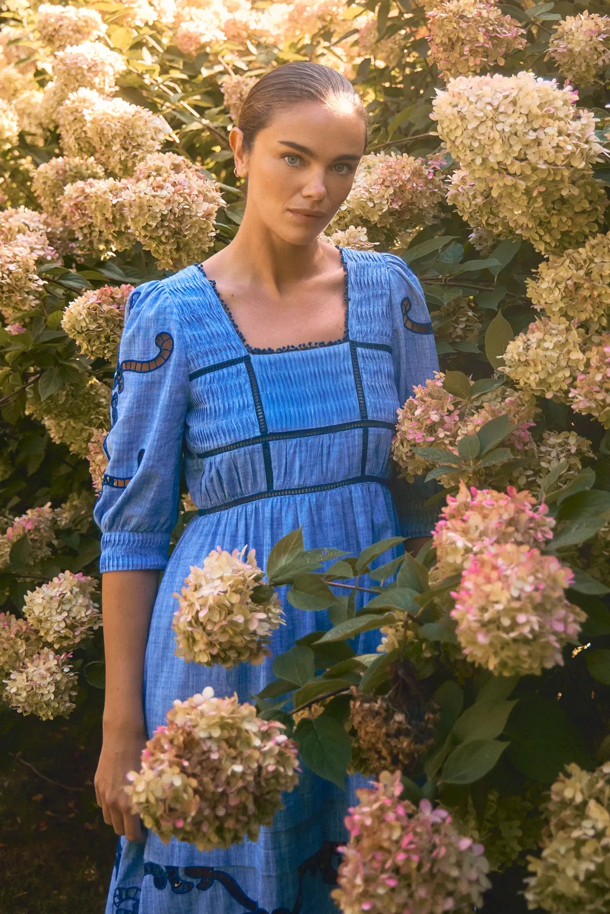 Embroidered Midi Dress with a square neckline, crochet lace tracing the bodice, skirt, and sleeves.