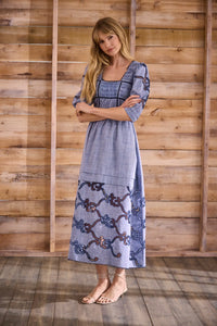 Embroidered Midi Dress with a square neckline, crochet lace tracing the bodice, skirt, and sleeves.