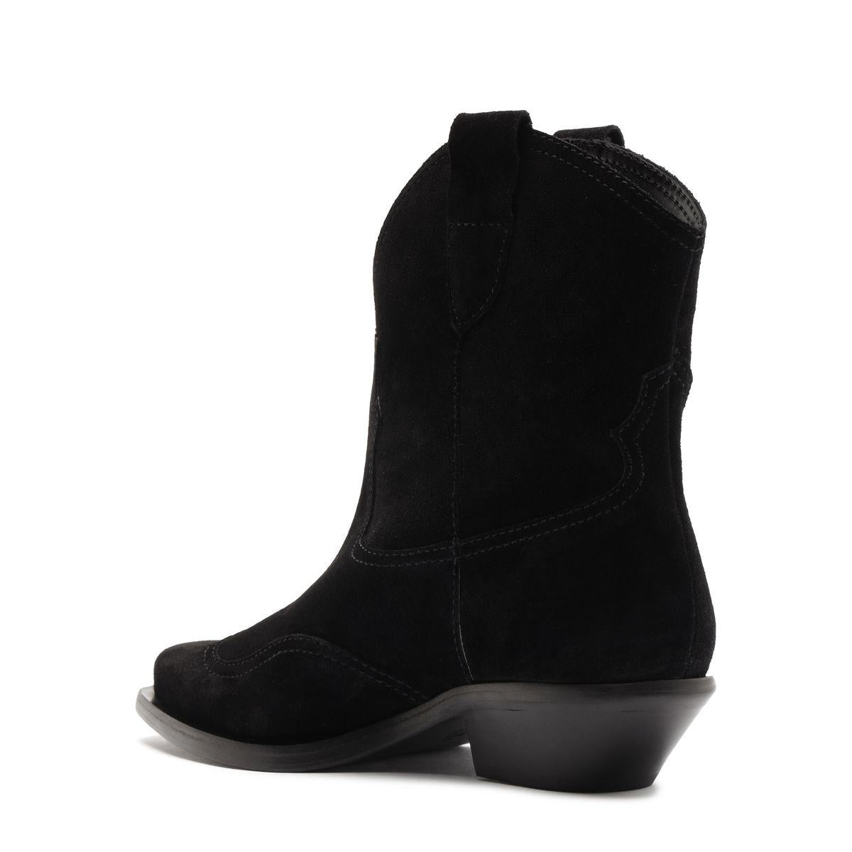 Side view of Nash suede bootie in black showcasing pointed toe and low block heel with a white background