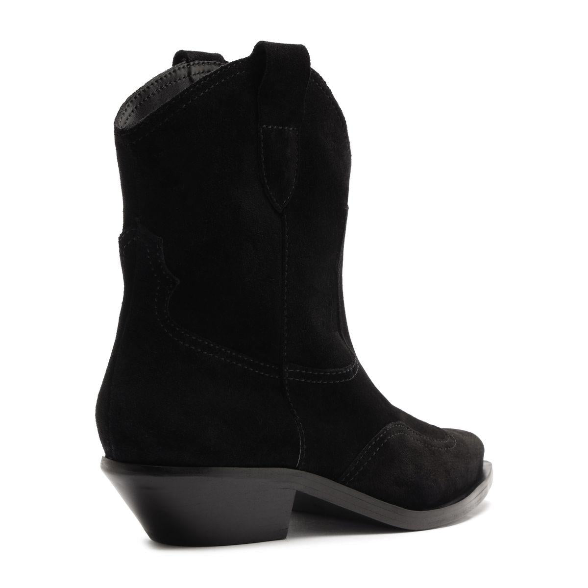 Side view of the Nash Suede Bootie in black showcasing its pointed toe and low block heel with a white background
