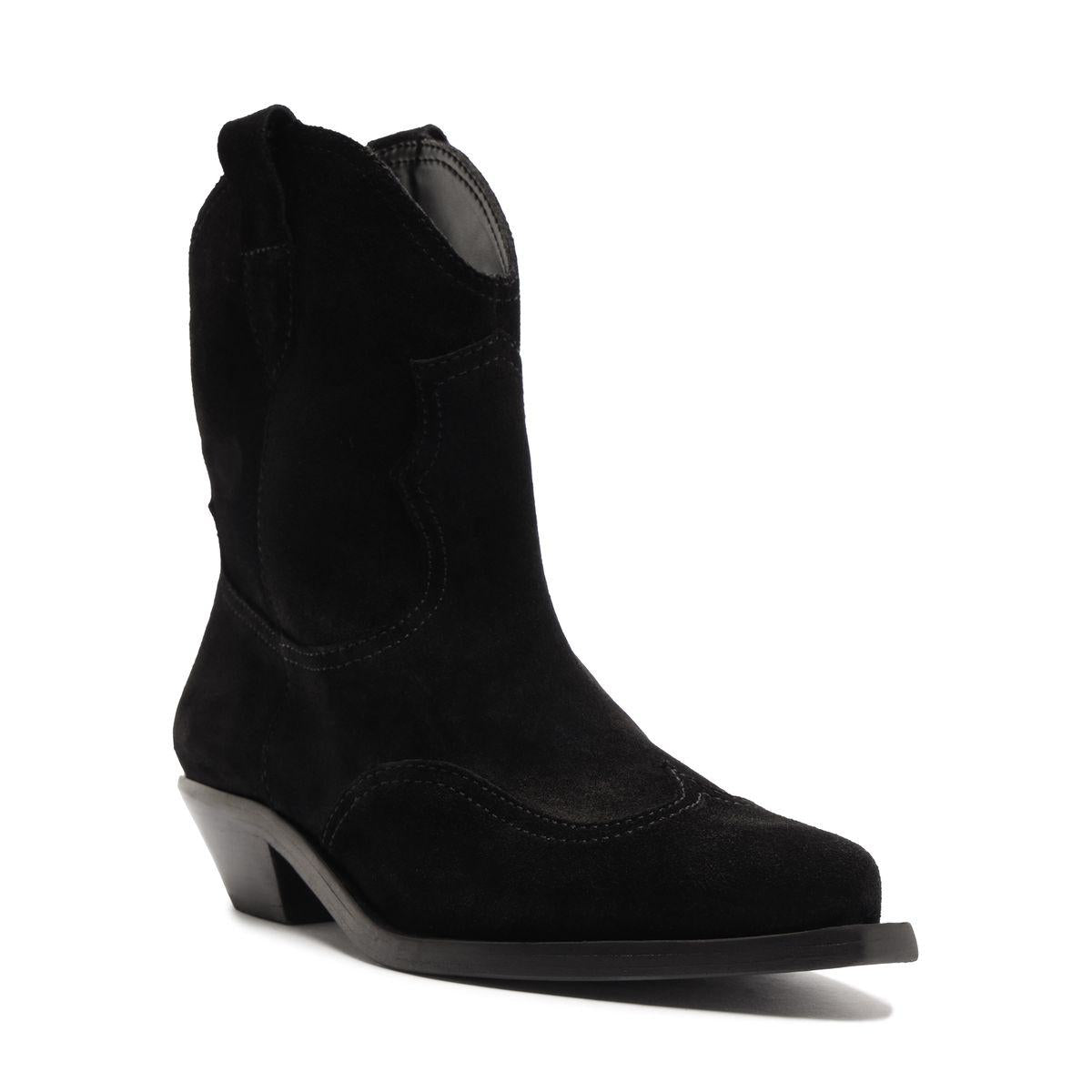 Three quarter view of Nash Suede Bootie in Black showcasing pointed toe, low block heel, and slip on shaft with white background