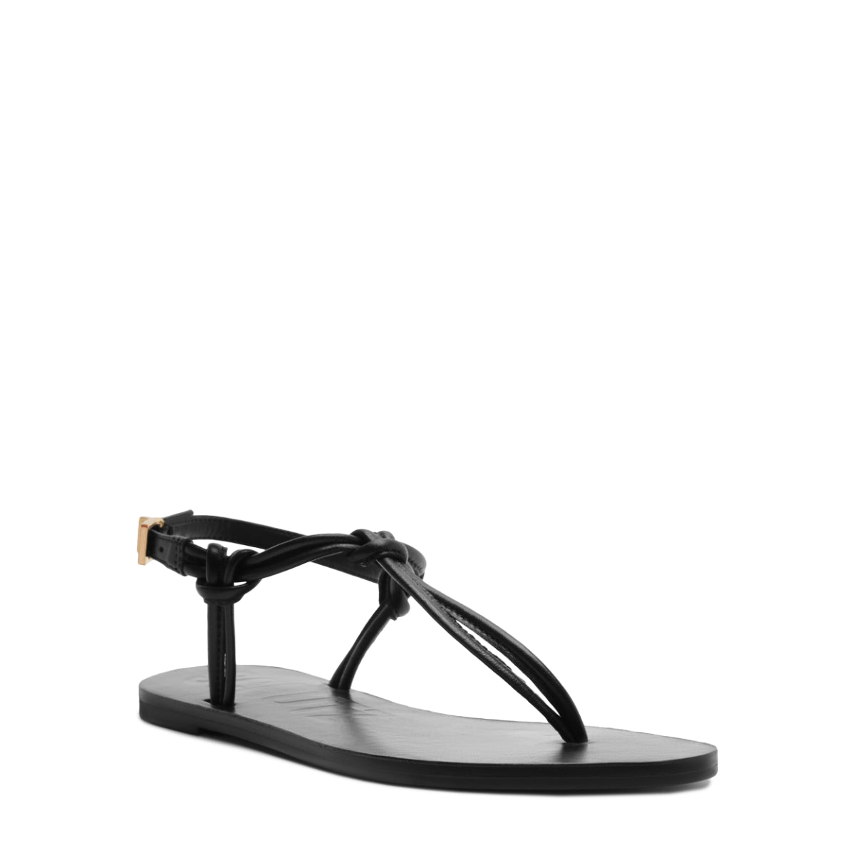 Front-side view of Nina black leather thong sandal showing knotted straps and adjustable gold-tone ankle buckle on white