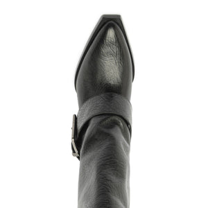 Close-up top view of Parker Up leather boot in black showcasing pointed toe and wraparound strap detail against a white background