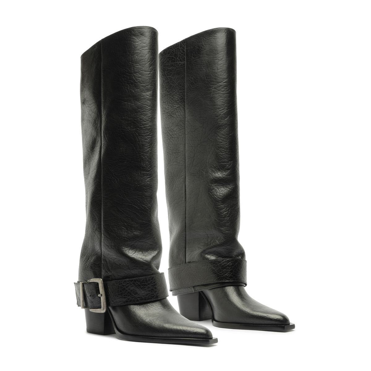 Front three-quarter view of Parker Up leather boots in black showcasing tall shafts and ankle buckles on a white background