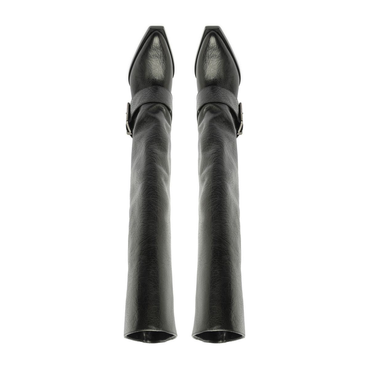 Rear view of Parker Up leather boots in black showcasing tall shafts and side buckles on a white background