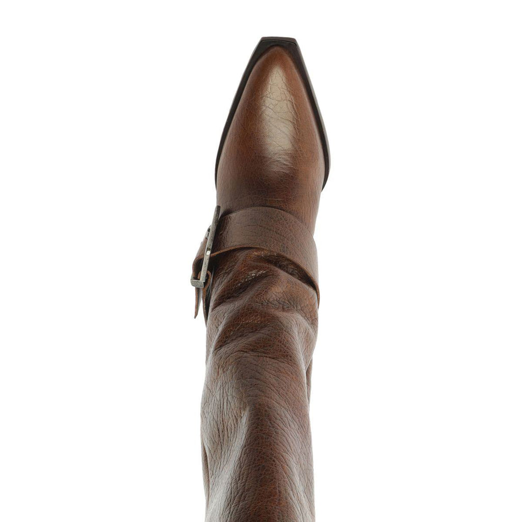 Close-up side view of Parker Up Leather Boot in Desert Brown showcasing ruched leather shaft and buckle strap on a white background