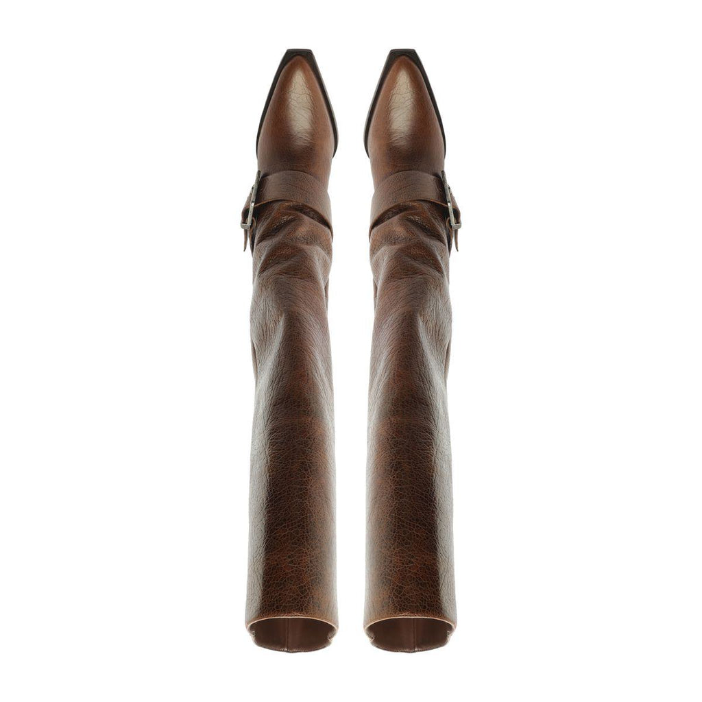 Front view of Parker Up Leather Boot in Desert Brown showcasing tall leather shafts and pointed toes against a white background