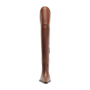 Side view of Raffaela over-the-knee leather boot in warm toffee showing tall shaft and side zipper against white background