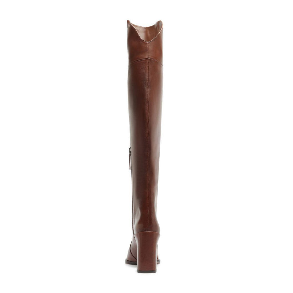Rear view of Raffaela over the knee leather boot in warm toffee showcasing tall shaft and heel with white background
