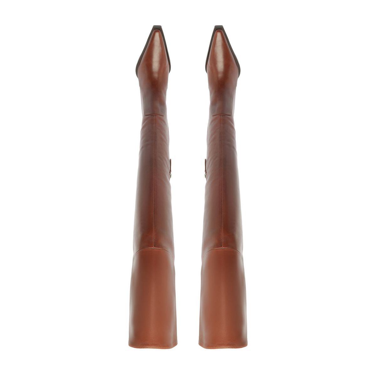 Rear view of Raffaela over-the-knee leather boots showcasing warm toffee leather with a white background
