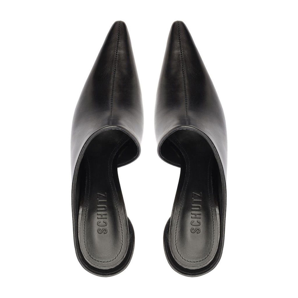 Top view of the Abby leather pumps in black showcasing pointed toes and open backs on a white background