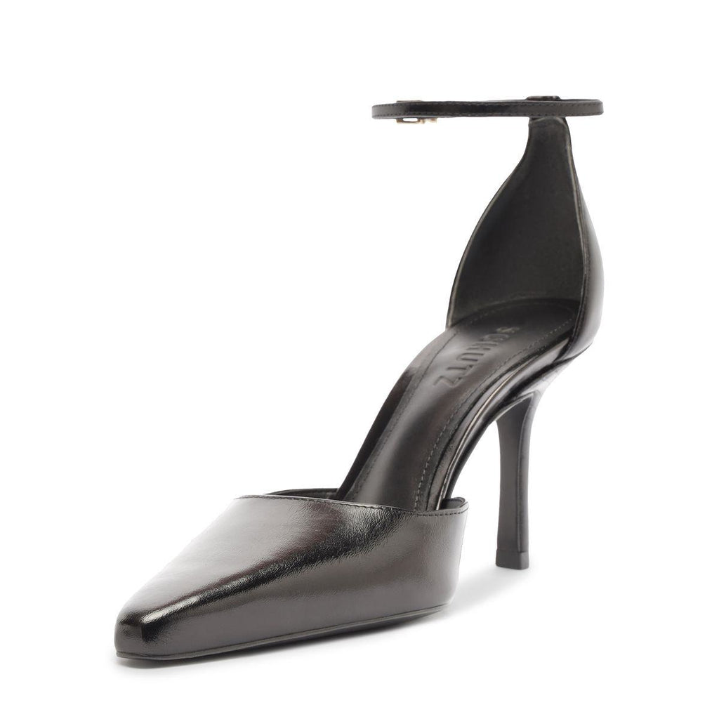 Front three-quarter view of Jenny Leather Pump in Black showcasing pointed toe, buckle detail, and stiletto heel on white background