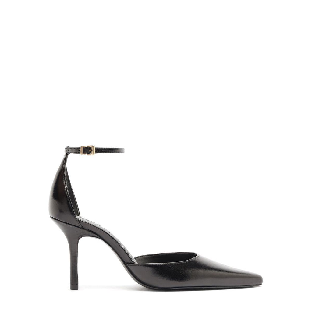 Side view of the Jenny Leather Pump in Black showcasing its pointed toe, stiletto heel, and ankle buckle strap on a white background