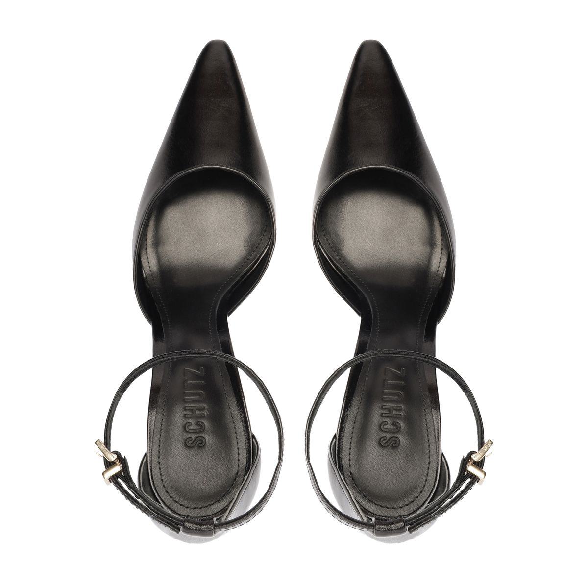 Top view of Schutz Jenny Leather Pump in Black showcasing pointed toes and ankle straps on a white background