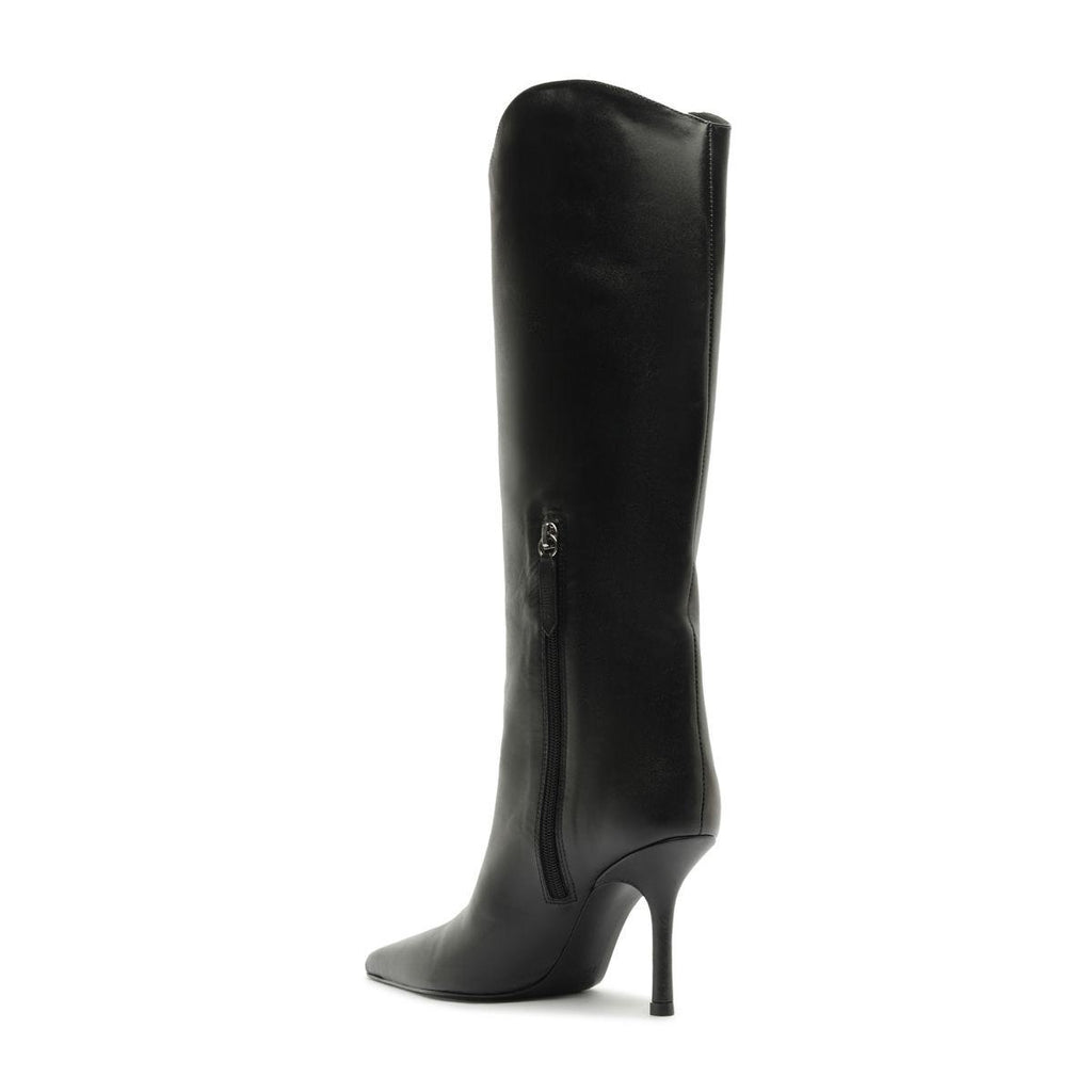 Side view of the Mary Ellen leather boot in black showcasing its tall shaft, pointed toe, and slim stiletto heel against a white background