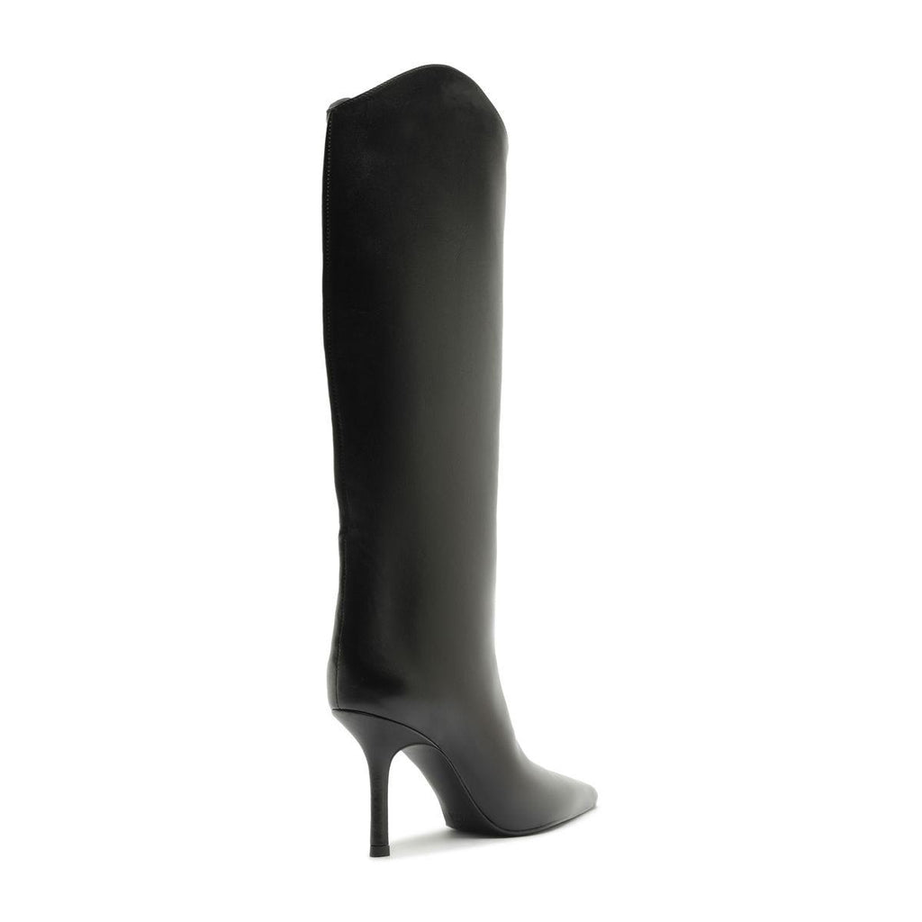 Side view of Mary Ellen Leather Boot in Black showcasing its tall shaft and stiletto heel with a white background