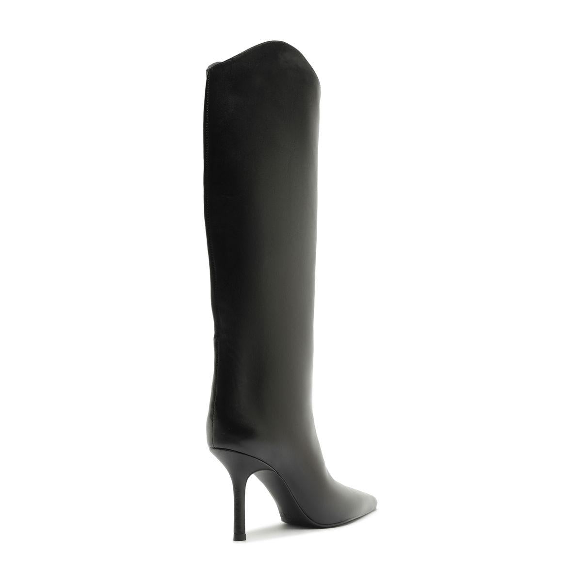 Side view of Mary Ellen Leather Boot in Black showcasing its tall shaft and stiletto heel with a white background