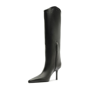 Side view of the black Mary Ellen leather boot showcasing its tall shaft, pointed toe, and slim heel on white