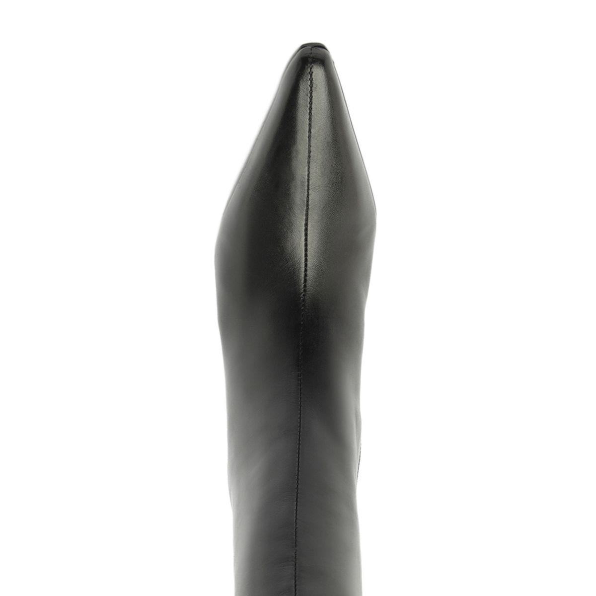 Close-up view of Mary Ellen leather boot in black showcasing smooth leather and a vertical seam against a white background