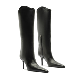 Front view of Mary Ellen black leather boots showcasing pointed toes and slim high heels with a white background
