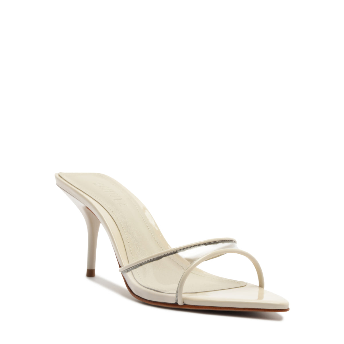 Front three-quarter view of Elodie vinyl sandal in Sugar White showcasing clear vinyl front strap, pointed toe, and stiletto heel on white background