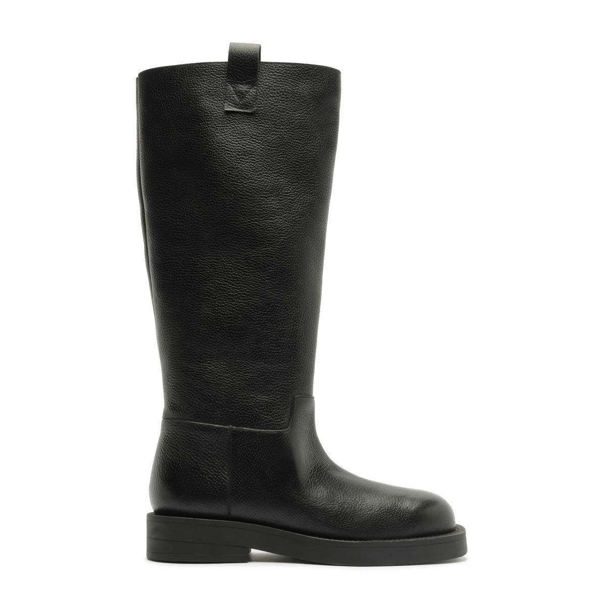 Side view of Betty Boot in Black showcasing its knee-high shaft, round toe, and block heel against a white background