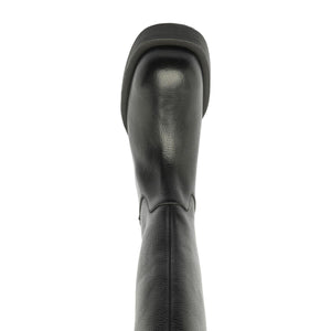 Close-up rear view of Betty Boot in Black showcasing its smooth leather shaft against a white background