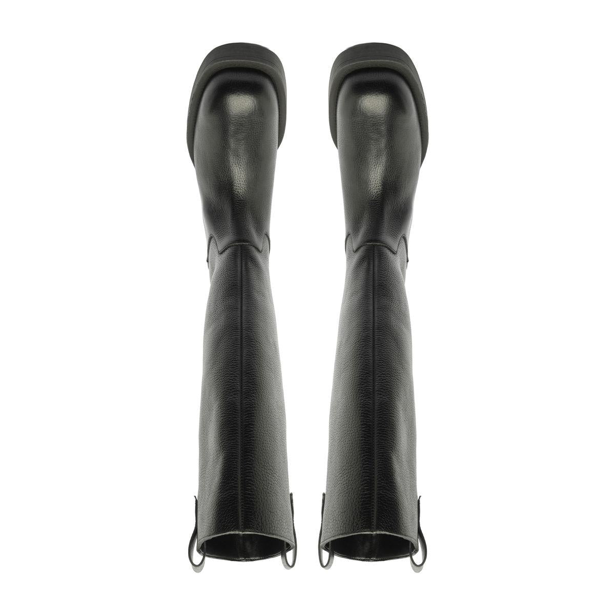 Rear view of Schutz Betty Boot in Black showcasing knee-high shafts and block heels against a white background