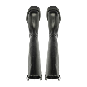 Rear view of Schutz Betty Boot in Black showcasing knee-high shafts and block heels against a white background