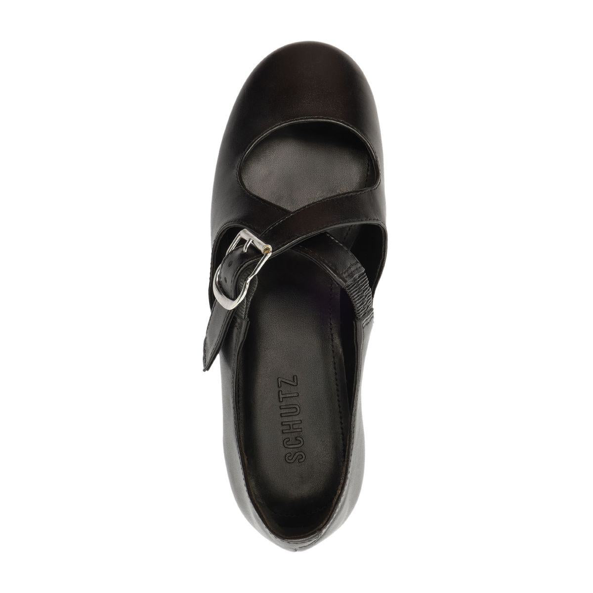 Top view of Molly Flat in Black showcasing its buckle strap and round toe on a white background