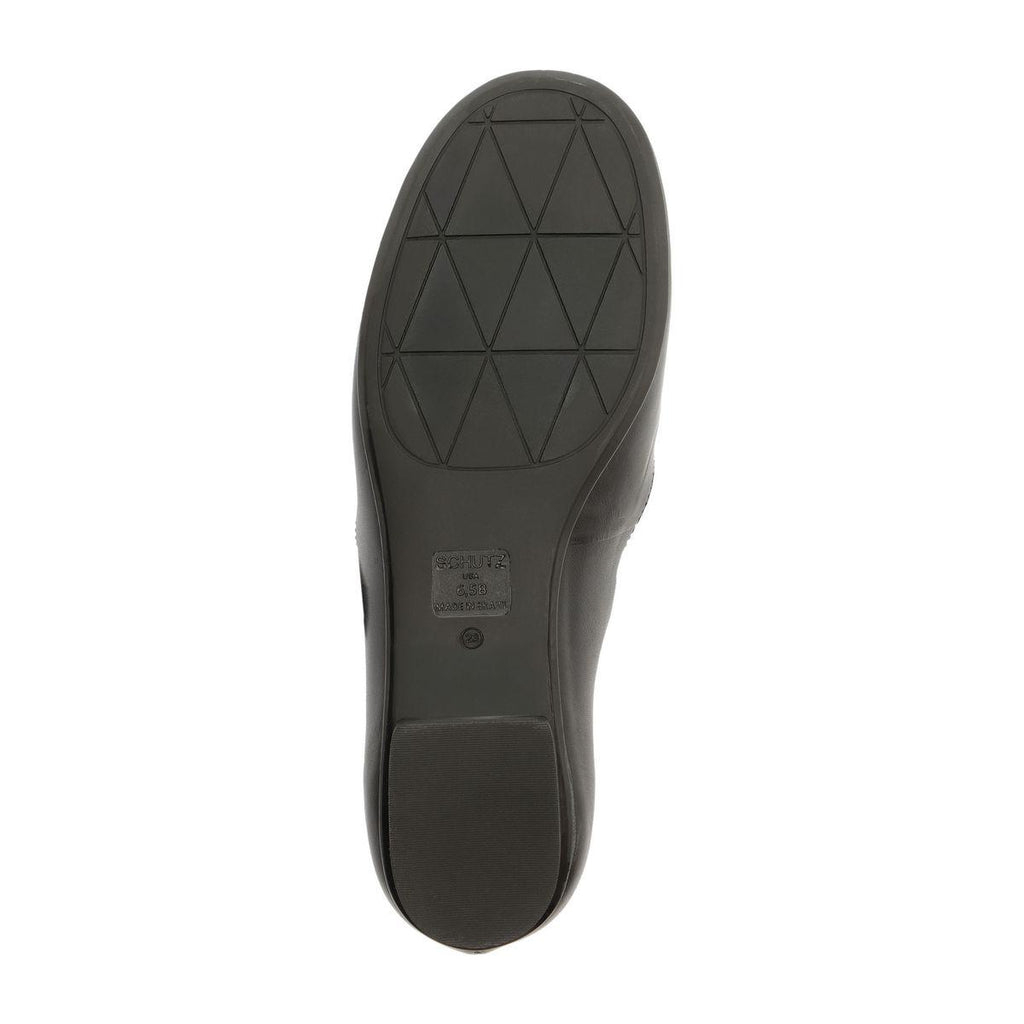 Bottom view of Molly Flat in Black showcasing geometric patterned synthetic outsole with white background
