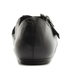 Rear view of Molly Flat in Black showcasing its closed counter and buckle strap with a white background