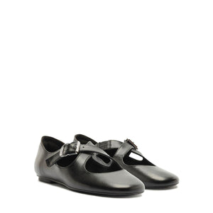 Front three quarter view of Molly Flat in Black showcasing the rounded toe and buckle strap with a white background