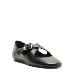 Three-quarter view of the Molly Flat in black showcasing its round toe, buckle strap, and closed counter on a white background