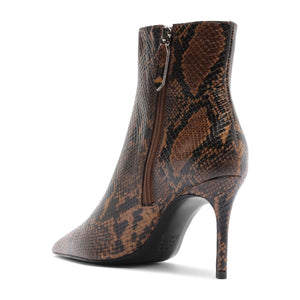 Side view of Mikki Bootie in Animal Print showcasing pointed toe, stiletto heel, and zip closure on white background