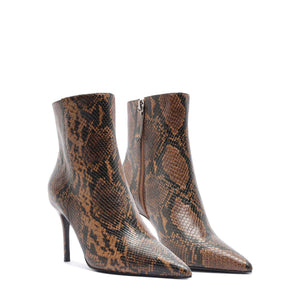 Side view of Mikki Bootie in Animal Print showcasing pointed toes and stiletto heels with a white background