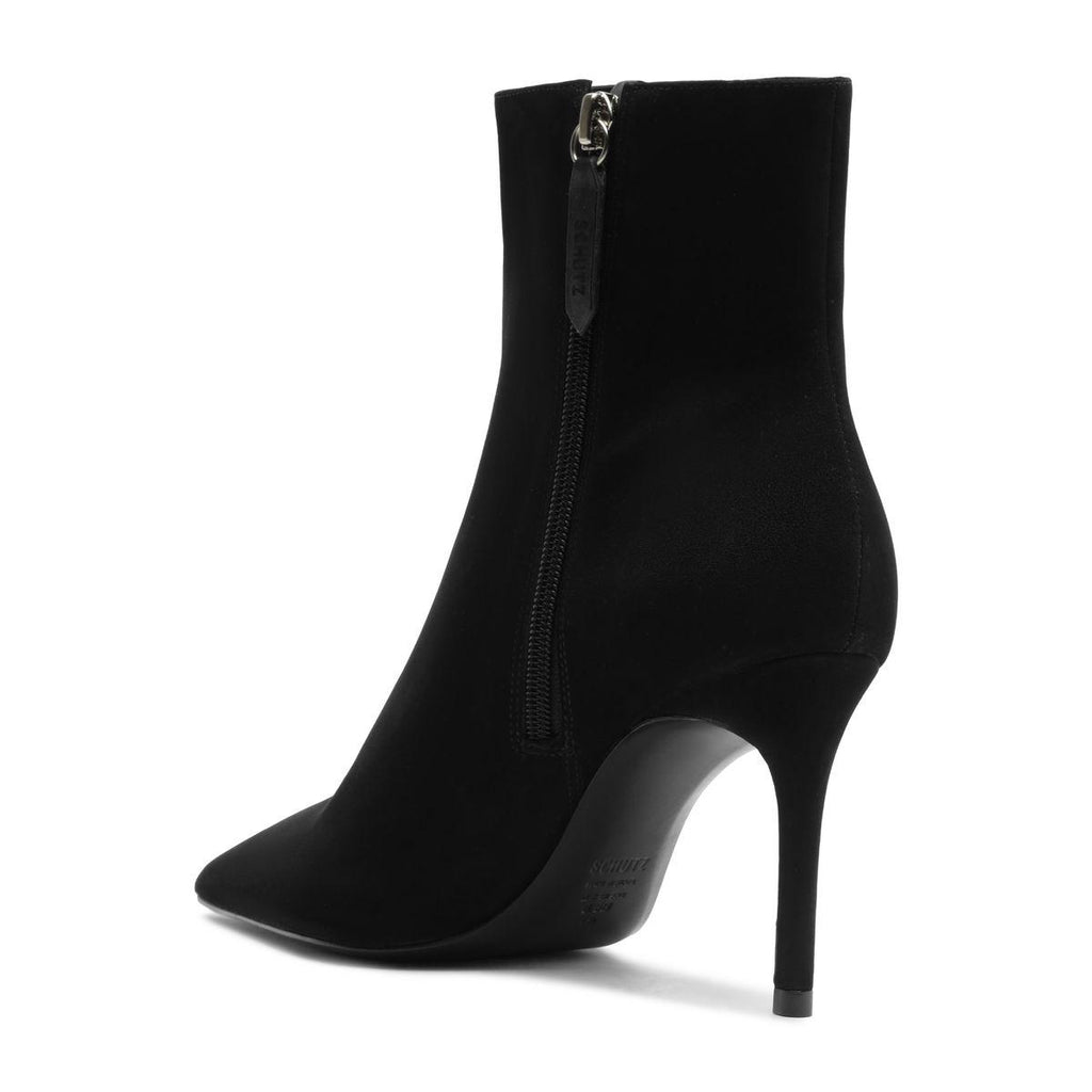 Side view of black Mikki bootie showcasing its pointed toe, zip closure, and stiletto heel with a white background