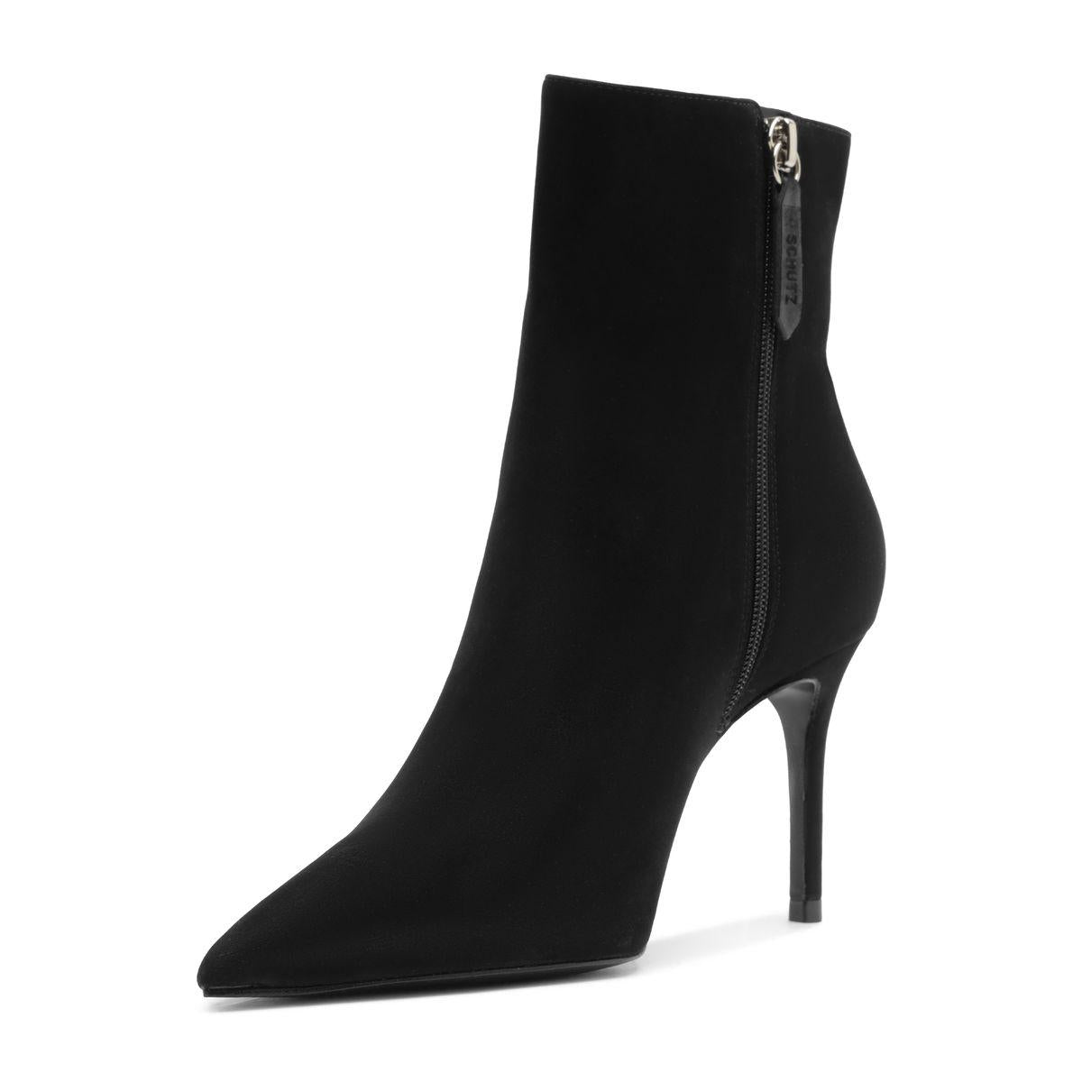 Side view of Mikki Bootie in Black showcasing pointed toe, stiletto heel, and zip closure on a white background