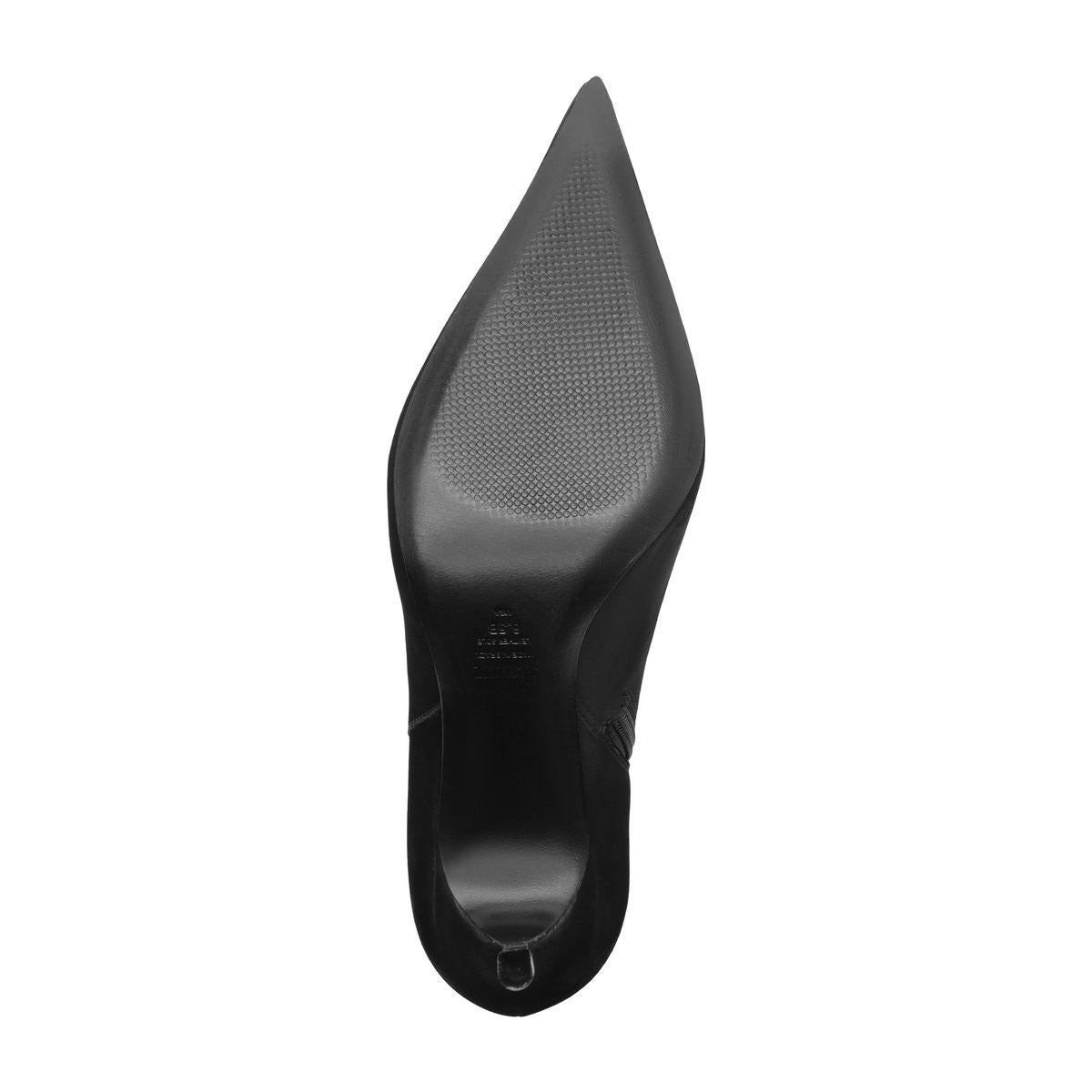 Underside view of Mikki Bootie in Black showcasing the leather outsole and pointed toe against a white background