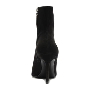 Rear view of Mikki Bootie in Black showcasing its stiletto heel and zip closure against a white background