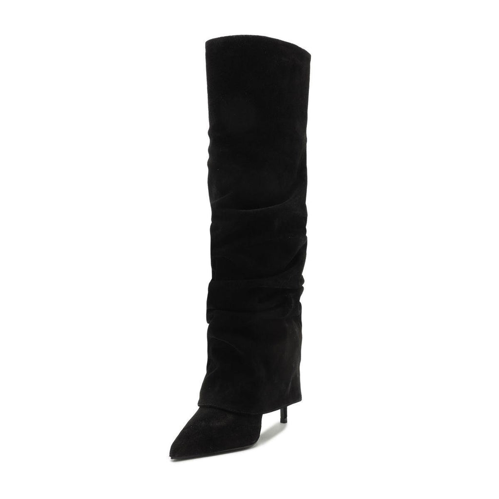 Side view of Mikki Up Cloak suede boot in black showcasing ruched shaft, pointed toe, and stiletto heel on white background