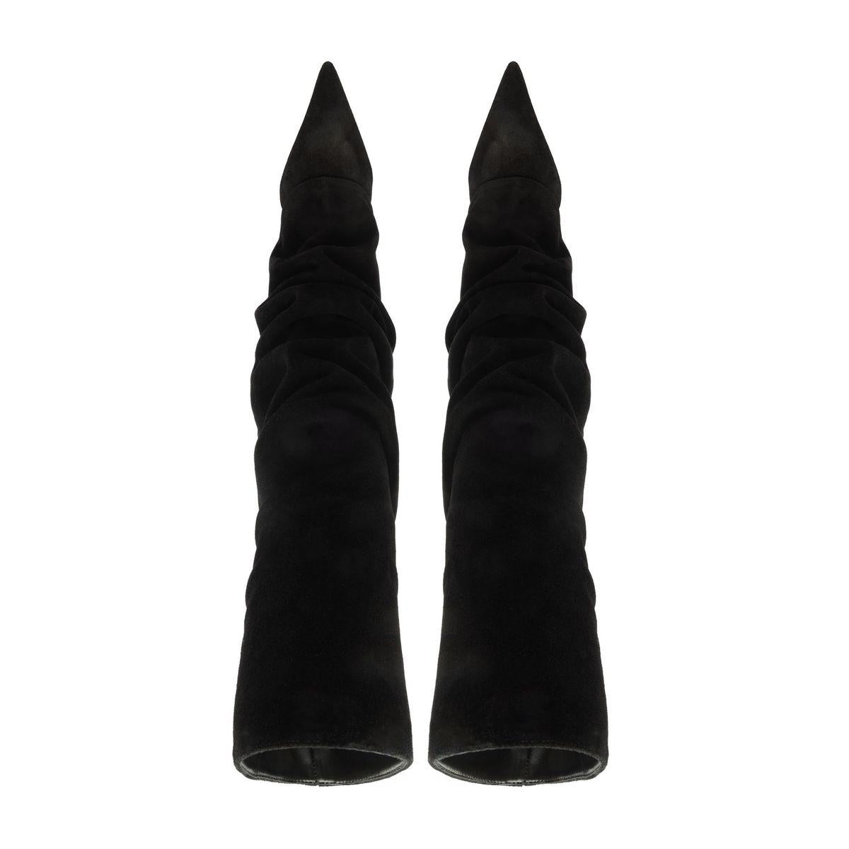 Front view of Mikki Up Cloak suede boots in black showcasing pointed toes and ruched shafts on a white background