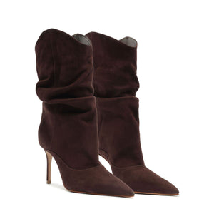 Front three-quarter view of Maryana slouch nubuck booties showcasing pointed toes and stiletto heels on a white background