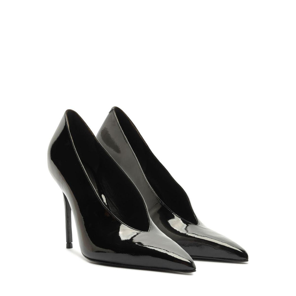 Three-quarter view of Claudia Patent Pump in Black showcasing pointed toes and high stiletto heels with a white background