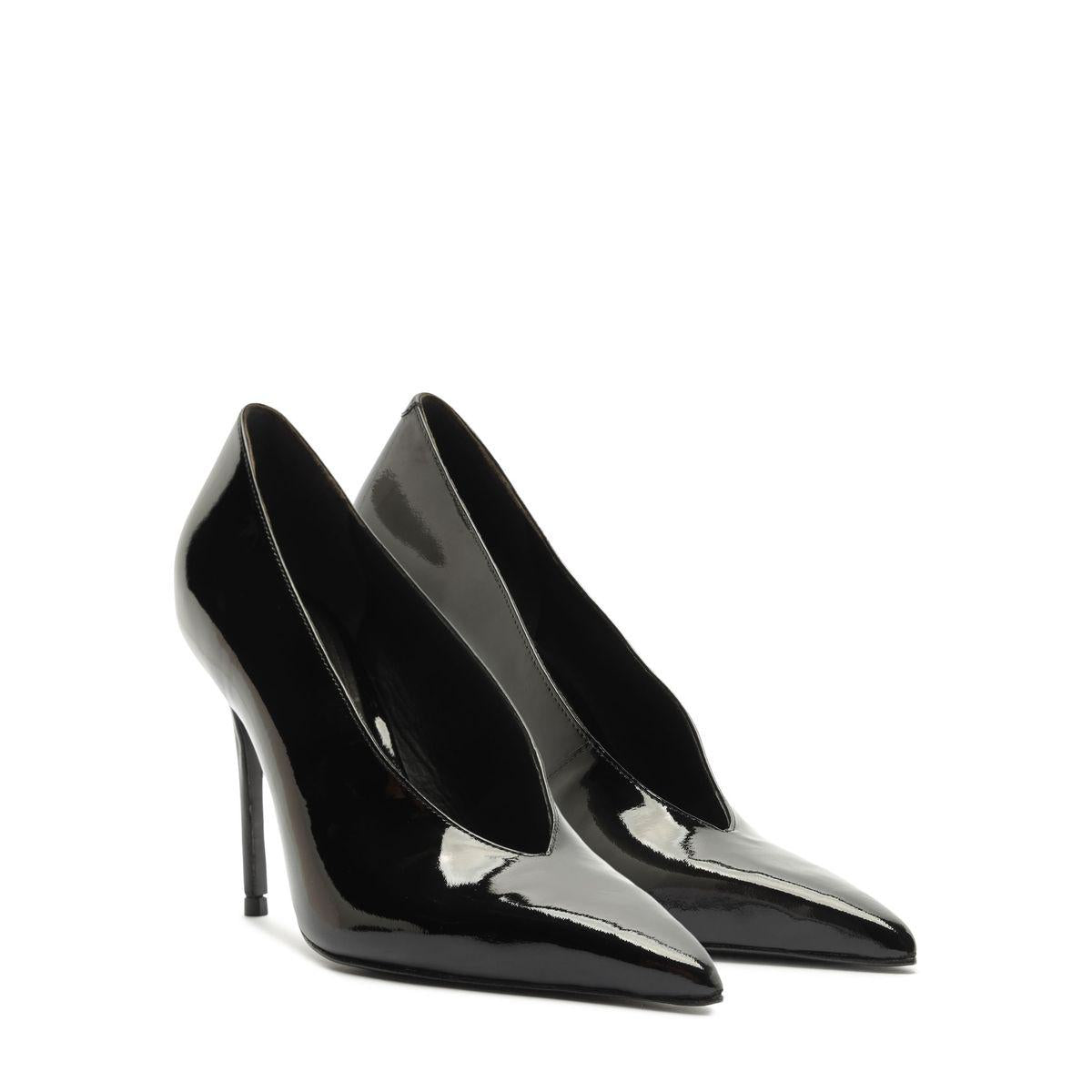 Three-quarter view of Claudia Patent Pump in Black showcasing pointed toes and high stiletto heels with a white background
