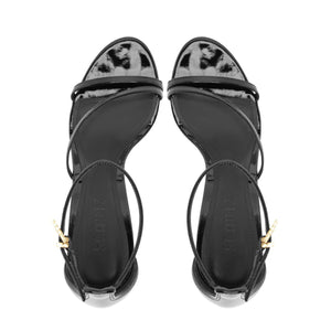 Top view of Tessa Patent Sandal in Black showcasing glossy patent straps and buckle closure on white background