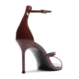 Side view of Tessa Patent Sandal showcasing glossy port burgundy patent leather straps and stiletto heel on white background