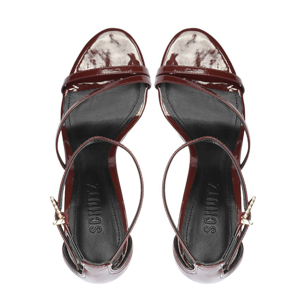 Top view of Tessa Patent Sandal in Port Burgundy showcasing glossy patent leather straps on a white background